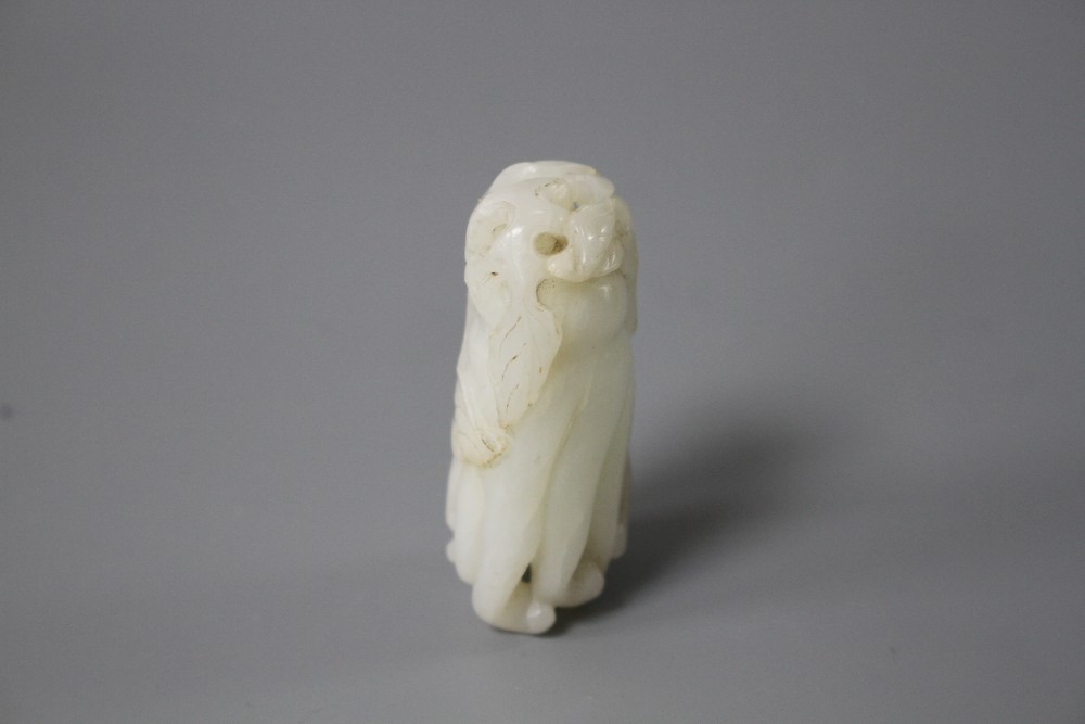 A Chinese jade carving of a finger citron, length 5.5cm, width 2.5cm, depth 2cm